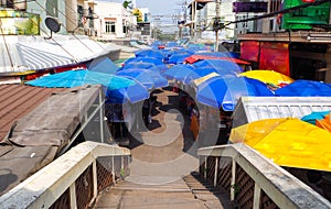 Colorful umbrella of street food shop Ampawa