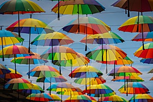 Colorful umbrellas background. Colorful umbrellas in the sky.