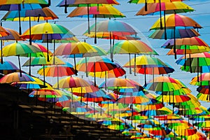 Colorful umbrellas background. Colorful umbrellas in the sky.