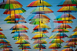 Colorful umbrellas background. Colorful umbrellas in the sky.