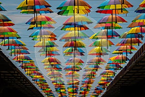 Colorful umbrellas background. Colorful umbrellas in the sky.