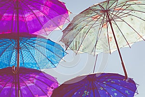 Colorful umbrellas background. Colorful umbrellas in the sky. Street decoration