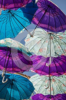 Colorful umbrellas background. Colorful umbrellas in the sky. Street decoration