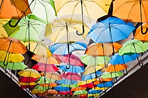 Colorful umbrellas hanging over the alley. Kosice, Slovakia