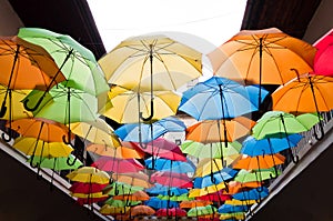 Colorful umbrellas hanging over the alley. Kosice, Slovakia
