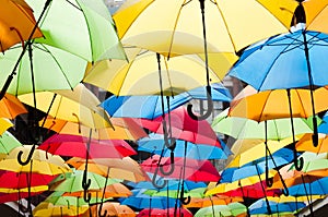 Colorful umbrellas hanging over the alley. Kosice, Slovakia