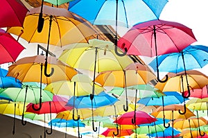 Colorful umbrellas hanging over the alley. Kosice, Slovakia