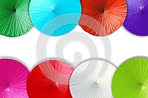 Colorful of umbrellas on white background.