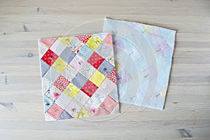 Colorful unfinished quilt with quilting pins