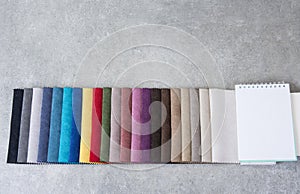 Colorful upholstery fabric samples in the store.