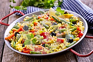 Colorful Vegetarian Paella Rice Dish Served in Pan