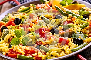 Colorful Vegetarian Paella Rice Dish Served in Pan