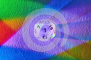 Colorful Victory Roll: D20 Dice on Rainbow Background