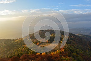 Colorful view over the mountain and green forest. Panoramic autumn scene from a hiking trail in Slovakia