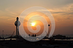 Colorful views, a play of colors at sunset. Night views of ships and piers at the port. Jeddah Port, Saudi Arabia.