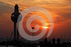 Colorful views, a play of colors at sunset. Night views of ships and piers at the port. Jeddah Port, Saudi Arabia.