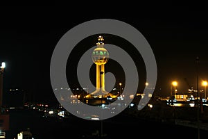 Colorful views, a play of colors at sunset. Night views of ships and piers at the port. Jeddah Port, Saudi Arabia.