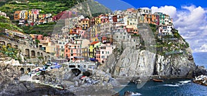 Colorful village Manarola in famous Cinque terre in Liguria, travel and landmarks of Liguria photo