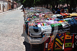 Colorful village and market of Purmamarca, Argentina photo