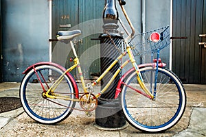 Colorful Vintage Bicycle Leaning on a New Orleans Lamppost
