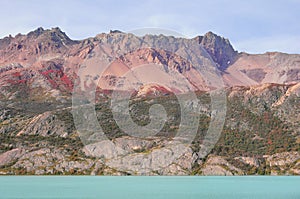 Colorful volcanic mountain by the lake. Los huemules park photo