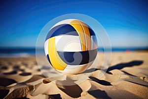 Colorful volleball ball lying on sunny beach near sea or ocean. Beach Volleyball ball on beach sand