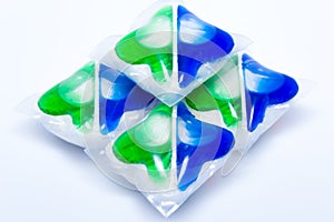 Colorful washing capsules for dishwasher on white background