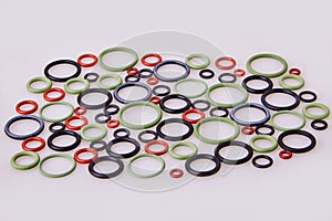 Colorful water level rubber gaskets scattered on the table.