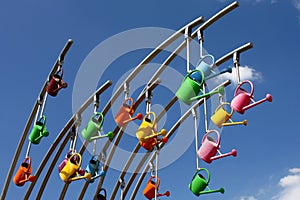 Colorful watering cans