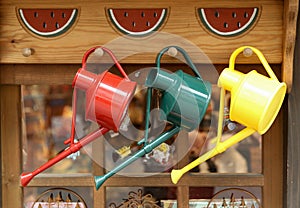 Colorful watering cans