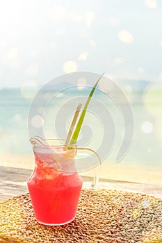 Colorful watermelon mocktail at the beach bar. Vacation, get away, summer outing concept