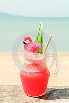 Colorful watermelon mocktail at the beach bar. Vacation, get away, summer outing concept