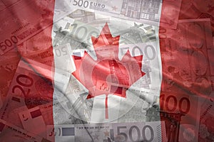 Colorful waving canadian flag on a euro background