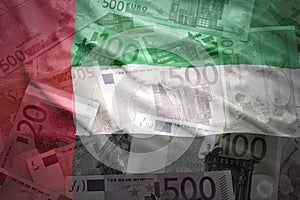 Colorful waving united arab emirates flag on a euro background