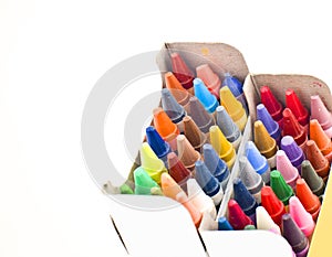 Colorful wax crayons in box