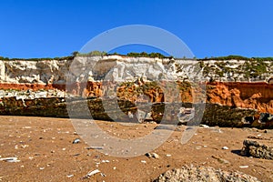 Colorful white-red cliffs in Hunstanton UK,boat wreck