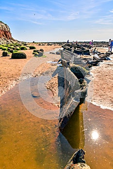 Colorful white-red cliffs in Hunstanton UK,boat wreck