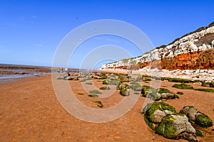 Colorful white-red cliffs in Hunstanton UK,boat wreck