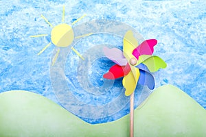 Colorful windmill on handmade environment