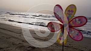 Colorful windmill toy in the seashore.