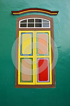 Colorful window a colonial house