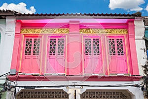 Colorful windows Sino-Portuguese style architecture at Phuket Thailand