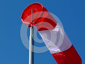 Colorful windsock or windbag, wind direction indicator.