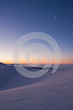 Colorful winter minutes before sunrise in the Carpathian mountains