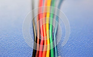 Colorful wires and cables closeup, used in telecommunication network and electrical systems