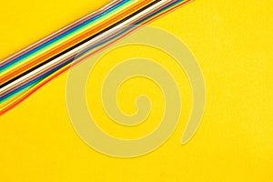 Colorful wires isolated on yellow background. connection wire for electrical schemes. copy space