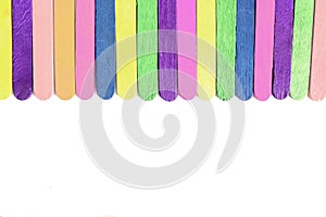 Colorful wood ice cream stick placed orderly photo