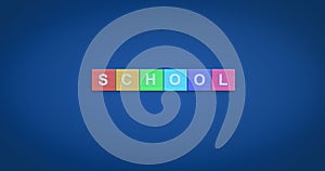 Colorful wooden blocks with the letters school on a gradient background photo