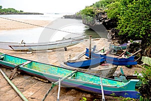 Colorful wooden boats on beach Kodi, Sumba Island, Nusa Tenggara