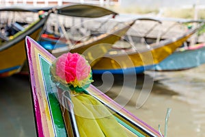 Colorful wooden boats at Damnoen Saduak Floating Market. Bangkok, Thailand
